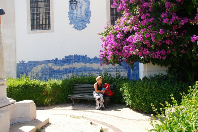 Young Girl on a Park Bench