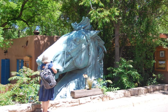 A Girl and Her Horse Head