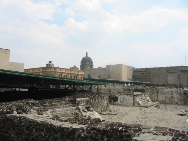 View of Eagle building and building A in the Templo Mayor complex. The ruins of the Great Temple are in the background.