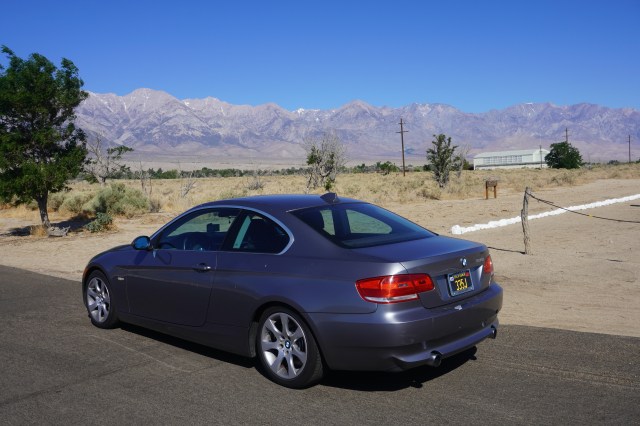 BMW with Visitor Center in Background